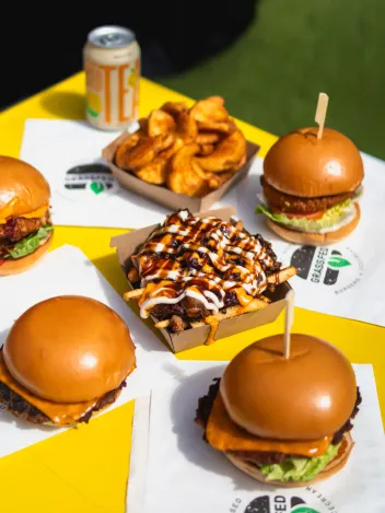 Vibrant commercial food photography for Grassfed vegan burgers and loaded fries in Brisbane